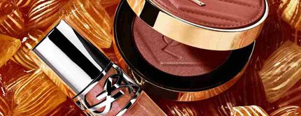 YSL-shimmerblush en gloss op amberkleurige snoepjes