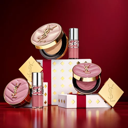 YSL-make-upproducten met feestelijke geschenkdozen.