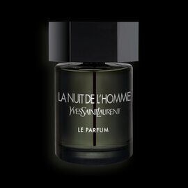 A dark glass bottle of "La Nuit de l'Homme" perfume by Yves Saint Laurent, featuring a sleek design and elegant black cap, set against a black background.