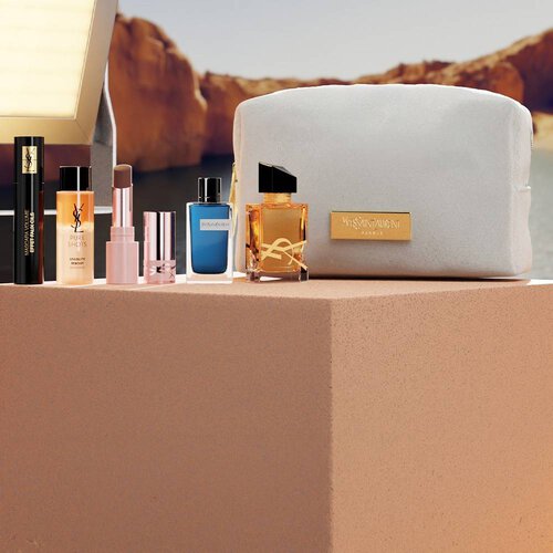 YSL beautyset met miniproducten en witte toilettas.
