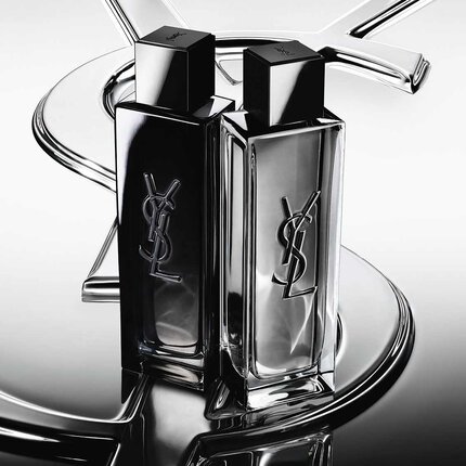 Twee YSL-parfumflacons in zwart en zilver