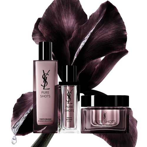 YSL Pure Shots huidverzorgingsproducten voor een donkere bloemachtergrond.