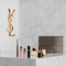 YSL beautyset met miniproducten en toilettas.
