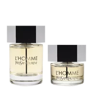 Close-up van YSL L'Homme Eau de Toilette-flessen in maten van 100 ml en 40 ml met helder glas en zwarte doppen op een witte achtergrond.