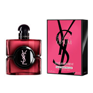 Black Opium Eau de Parfum Pink Glaze flacon naast de
                        fuchsiakleurige en zwarte doos met het YSL Cassandre-logo.
